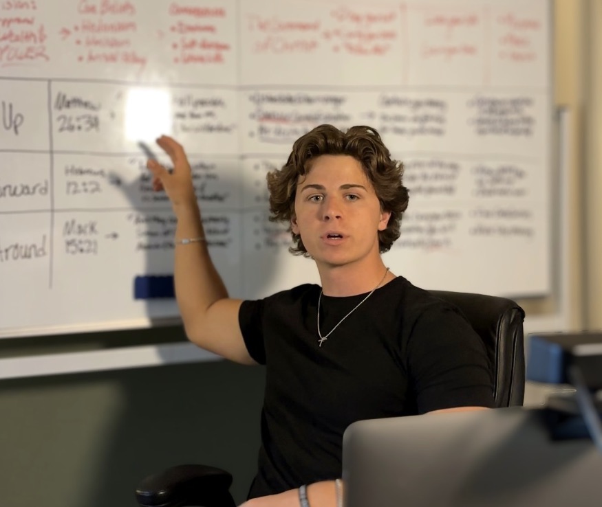 Nate teaching the brotherhood at the whiteboard